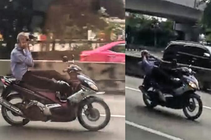 Таиланд. Новости: Безумный мужик на мотоцикле исполняет трюки прямо на дороге.