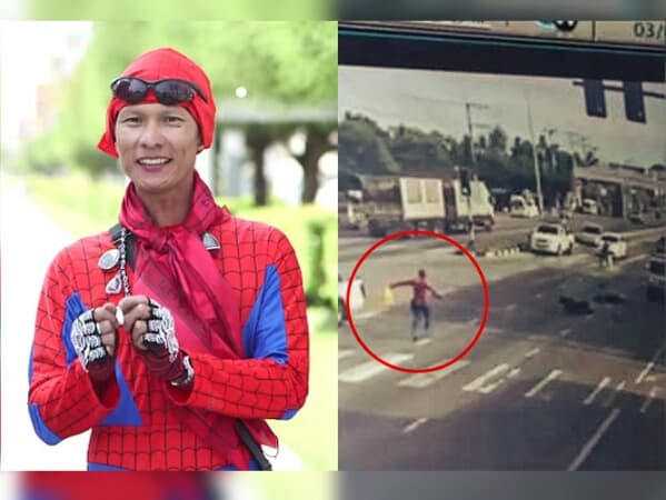 Таиланд. Новости: Спайдермен с цветами спас мотоциклиста, попавшего в аварию.